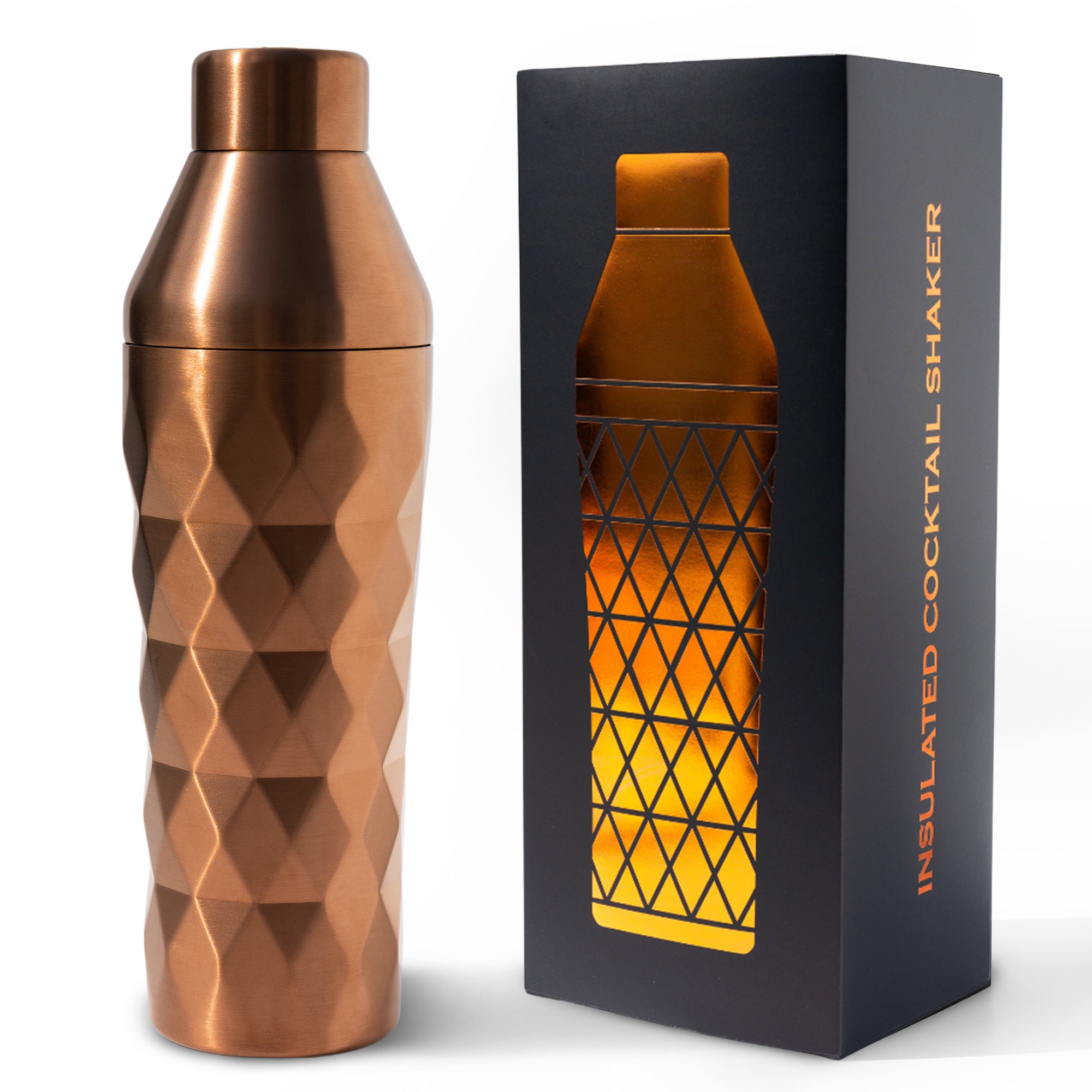Copper insulated cocktail shaker with geometric pattern next to its packaging box.
