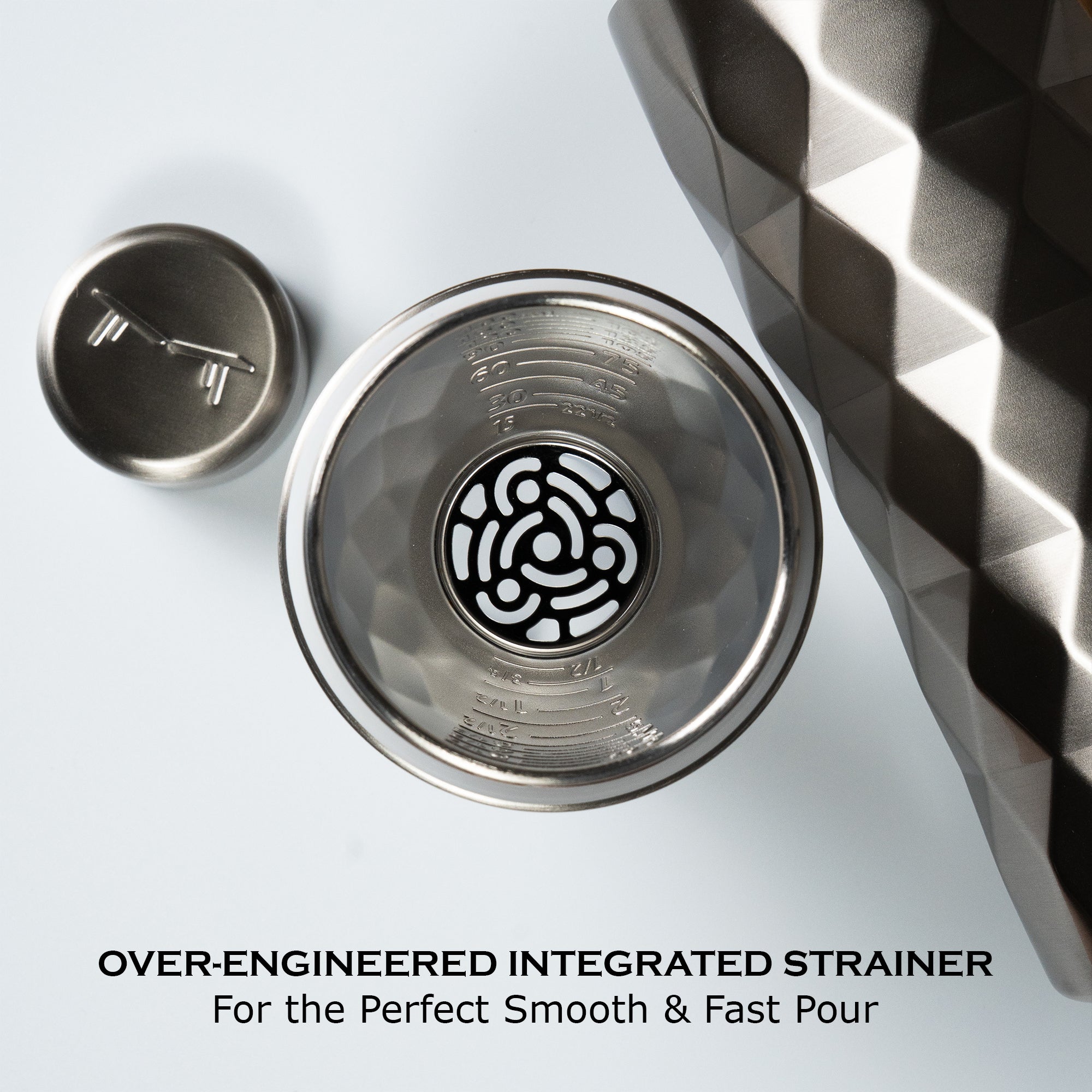 Metallic drink strainer on a white background with text 'Over-Engineered Integrated Strainer'.