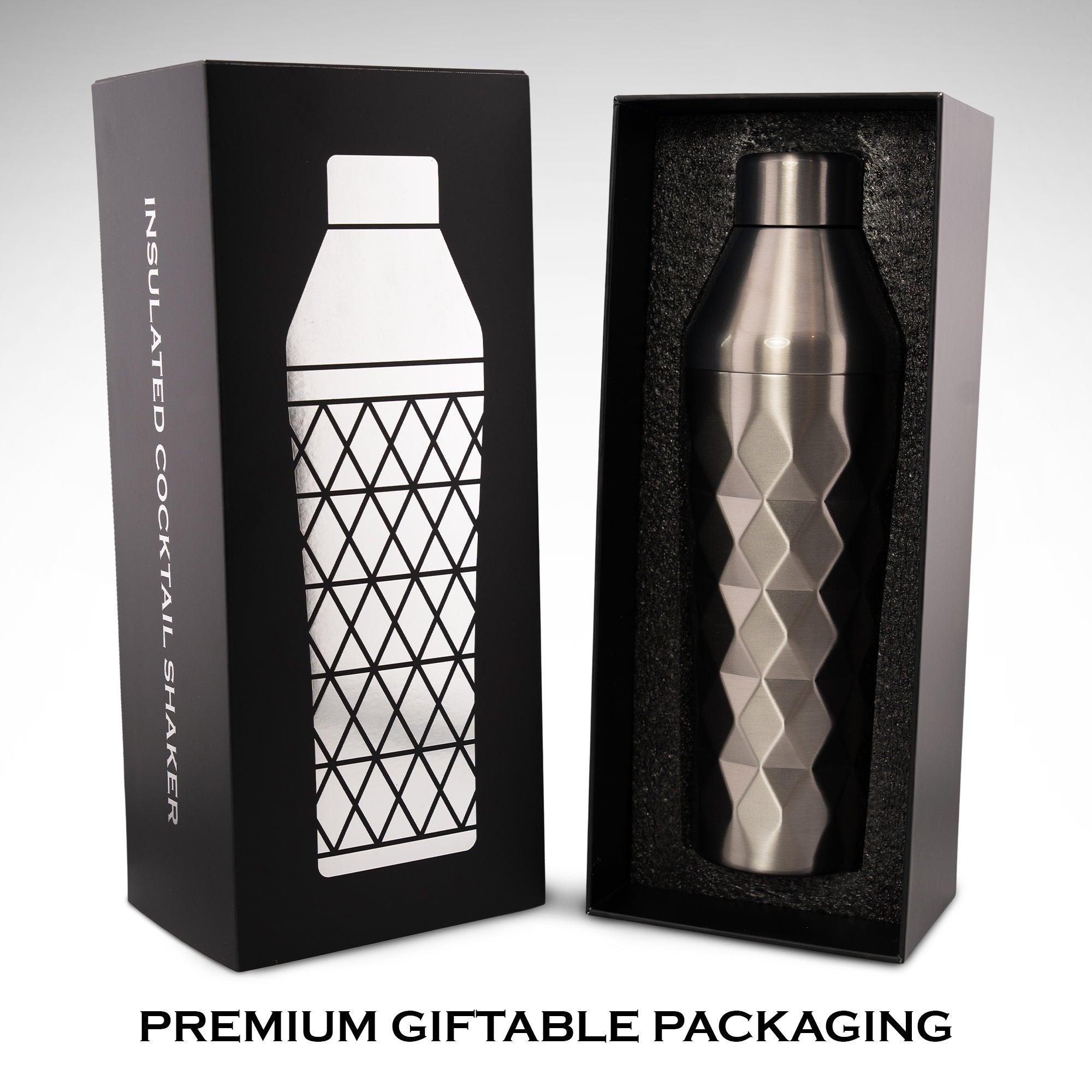 Stainless steel cocktail shaker in premium gift packaging with branded box.